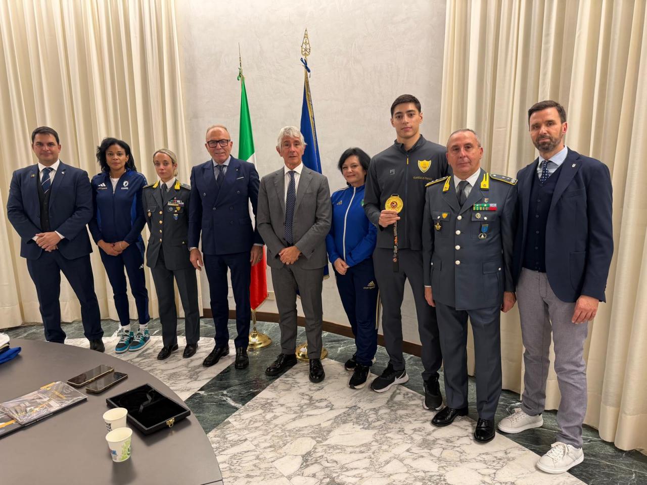 images/NewsFederazione/large/Avanzini_Morsiani_e_la_delegazione_italiana_dal_ministro_Abodi.jpeg